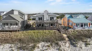 5127 W Beach Drive, Oak Island, NC 28465 – photo 4: 63_drone