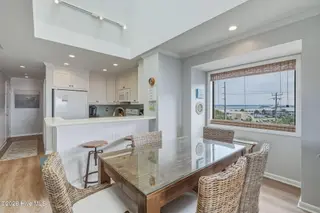 2111 W Fort Macon Road 313 Dunescape, Atlantic Beach, NC 28512 – photo 8: Dining area with ample natural light