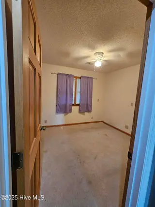3235 Marsh View Drive SW, Supply, NC 28462 — 3-bedroom home in Lockwood Folly, Supply, NC, photo 19 of 36: Bedroom 3