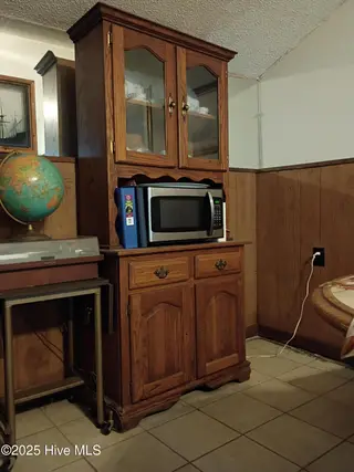 2391 Bill Hooks Road, Whiteville, NC 28472 – photo 16: 2391 cabinet