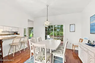 109 Oakleaf Drive, Pine Knoll Shores, NC 28512 – photo 16: Dining to Back deck