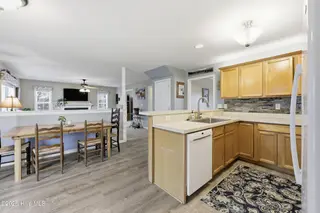 101 Majesty Court, Elizabeth City, NC 27909 – photo 17: 101 Majesty Ct kitchen dining to LR sepa