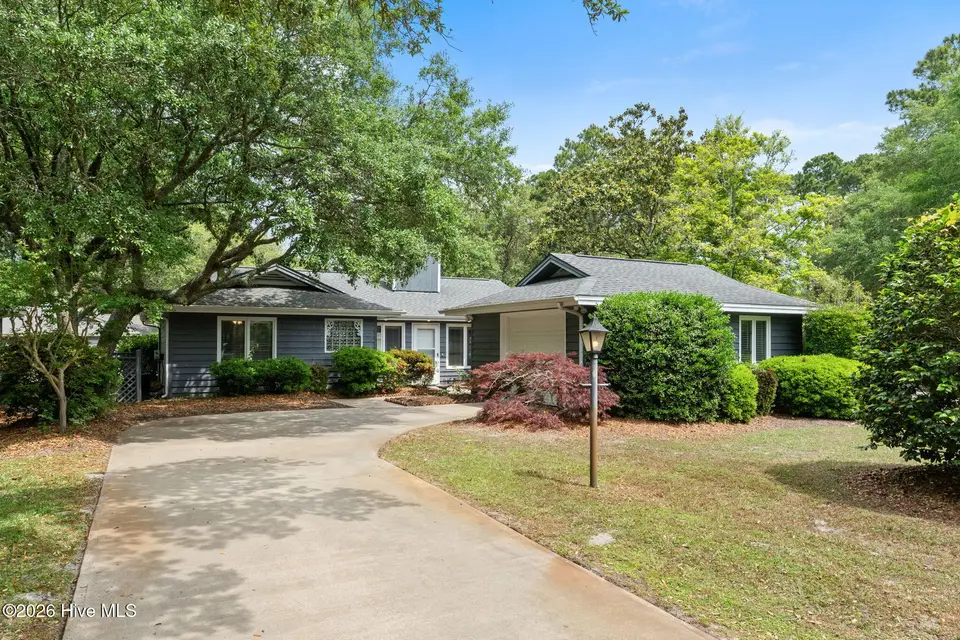 604 Camellia Lane, Sunset Beach, NC 28468 – photo 1 of 74: 1-web-or-mls-604 Camellia Ln 1