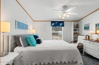 7203 Banner Street SW, Ocean Isle Beach, NC 28469 — 3-bedroom manufactured home in Seaside Heights, Ocean Isle Beach, NC, photo 14 of 38: Master Bedroom