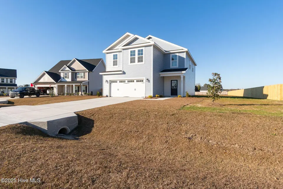 209 Shadow Grass Court, Stella, NC 28582 – photo 1 of 48: Front Exterior