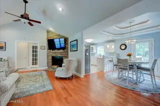 1704 Caracara Drive, New Bern, NC 28560 – photo 3: Kitchen and living room