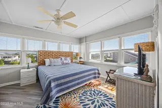 5127 W Beach Drive, Oak Island, NC 28465 – photo 20: 41_bedroom