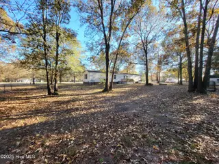 119 Edgewater Lane, Richlands, NC 28574 — 2-bedroom manufactured home in Chapel Ridge, Richlands, NC, photo 12 of 34: Backyard