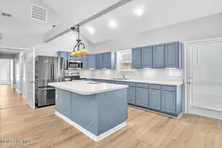 127 NW 19th Street, Oak Island, NC 28465 – photo 4: Kitchen with updated appliances