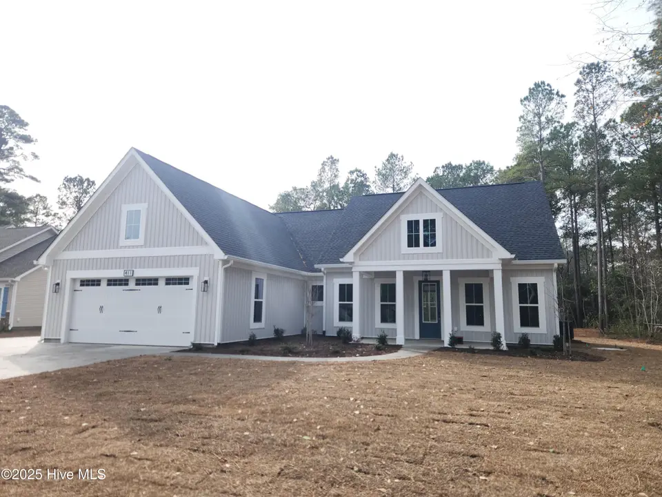 411 Boundaryline Drive NW, Calabash, NC 28467 – photo 1 of 11: 20251217_120624