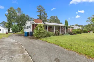 712 Page Drive, Jacksonville, NC 28540 — 4-bedroom home in Northwoods, Jacksonville, NC, photo 2 of 18: Front Side