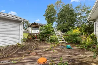 712 Page Drive, Jacksonville, NC 28540 — 4-bedroom home in Northwoods, Jacksonville, NC, photo 17 of 18: Deck