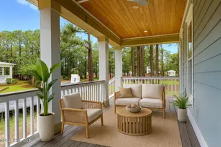 9148 E Lake Road, Calabash, NC 28467 – photo 2: 397 Front Porch 2 - VS