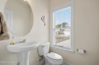 1013 Meadowlands Trail NW, Calabash, NC 28467 – photo 4: Half Bath off of Foyer