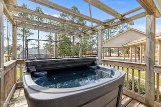 303 N Lincoln Street, Benson, NC 27504 – photo 11: Back Deck - Hot tub
