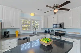 316 E Dolphin Drive, Oak Island, NC 28465 – photo 6: 316EDolphinDr - 23