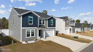 7051 Woodline Drive SW, Sunset Beach, NC 28468 – photo 2: 42_dji_20260303143452_0001_d