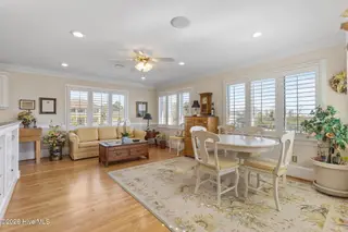 101 Lookout Ridge, Cedar Point, NC 28584 – photo 16: sunroom/eat in kitchen with water views