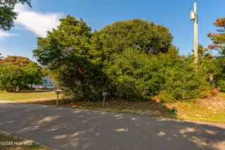 104 Juniper Road, Pine Knoll Shores, NC 28512 – photo 9: Vacant lot in Pine Knoll Shores