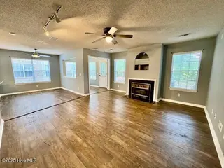 2928 Mulberry Lane A, Greenville, NC 27858 – photo 9: Open Living Room, Dining Area & Sunroom