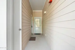 180 Clubhouse Road Apt 2, Sunset Beach, NC 28468 – photo 3: Front Door