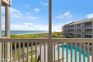 2111 W Ft Macon Road 248 Dunescape, Atlantic Beach, NC 28512 – photo 7: Covered deck off of primary suite