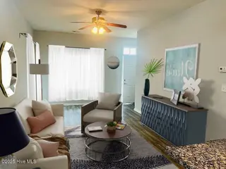 702 Pirates Landing Drive, Beaufort, NC 28516 – photo 13: Virtually Staged Living Room