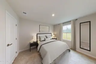 8187 Sterling Oaks Drive NW, Ash, NC 28420 — 3-bedroom home in Sterling Oaks, Ash, NC, photo 17 of 17: First Floor Bedroom