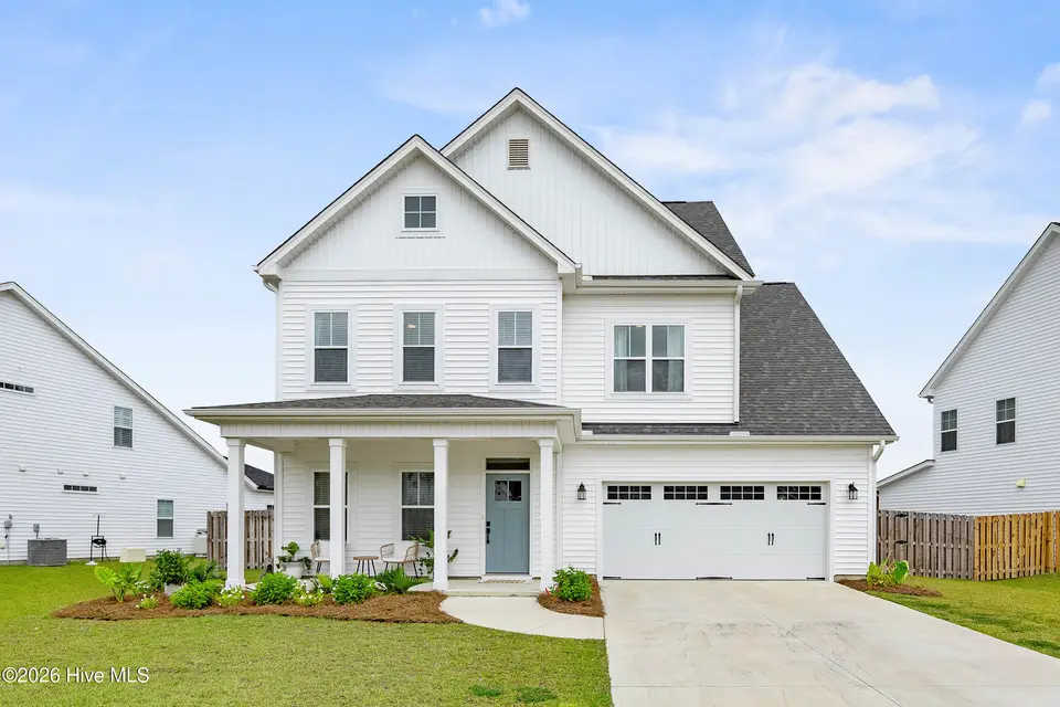 424 Northern Pintail Place, Hampstead, NC 28443 — 4-bedroom home in Magnolia Reserve, Hampstead, NC, photo 1 of 68: 1_front exterior