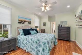 165 Cedar Lane, Newport, NC 28570 — 3-bedroom home in Gull Harbor, Newport, NC, photo 15 of 48: Primary Bedroom w/ Hardwood Floors