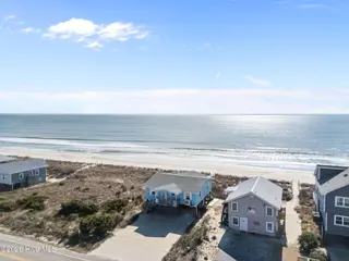 1011 W Beach Drive, Oak Island, NC 28465 – photo 3: 7-web-or-mls-DJI_20260122121815_0273_D