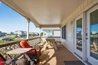 4328 E Dolphin Drive, Oak Island, NC 28465 – photo 6: 06-kahunaphoto - Copy
