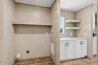 7601 Alice Court, Castalia, NC 27816 – photo 22: Laundry Area