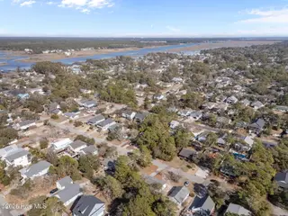 214 NE 50th Street, Oak Island, NC 28465 – photo 6: 5-web-or-mls-DJI_20260212141656_0020_D