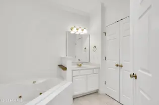 1009 N Sanderling Drive, Leland, NC 28451 — 3-bedroom townhome in Waterford of the Carolinas, Leland, NC, photo 20 of 63: Primary Bath