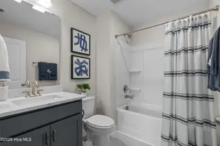 136a Arnette Drive SW 17a, Ocean Isle Beach, NC 28469 – photo 24: upper lvl full bath