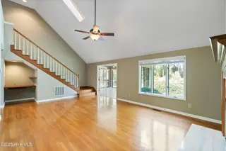 153 Olde Point Road, Hampstead, NC 28443 – photo 4: living room stairs