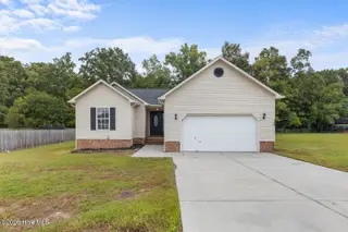 144 Forest Bluff Drive, Jacksonville, NC 28540 — 3-bedroom home in River Hills, Jacksonville, NC, photo 1 of 28: Front