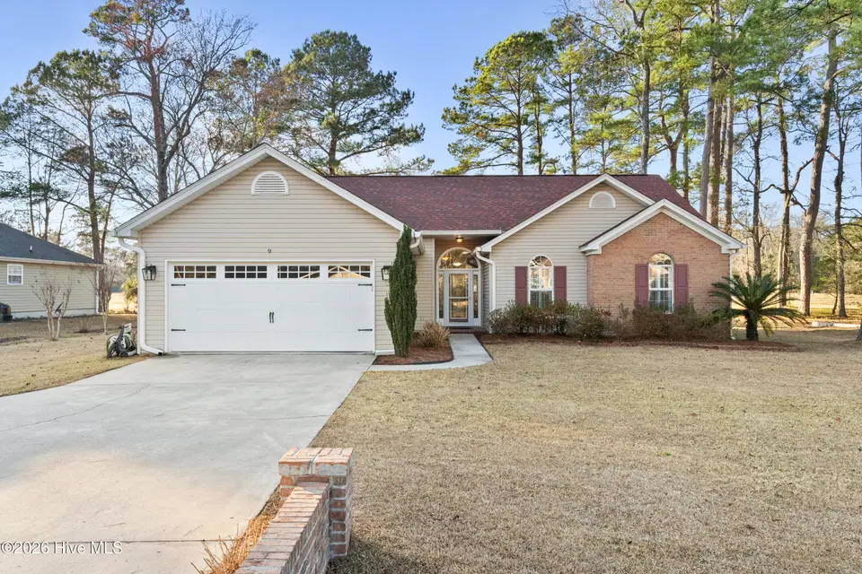 9 Golf Crest Court, Carolina Shores, NC 28467 — 3-bedroom home in Carolina Shores, Carolina Shores, NC, photo 1 of 46: Front of Home