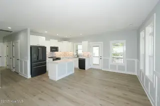 104 NE 52nd Street, Oak Island, NC 28465 – photo 4: 104 NE 52nd St Oak Island NC-large-005-0