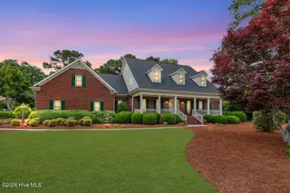 8401 Fazio Drive, Wilmington, NC 28411 – photo 4: 8401 Fazio front of home dusk