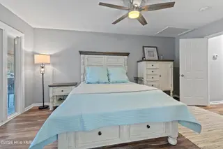 606 Camellia Lane, Sunset Beach, NC 28468 – photo 24: Primary bedroom