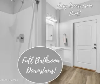 804 E Oak Island Drive, Oak Island, NC 28465 – photo 6: 804 E OAK ISLAND DR DOWNSTAIRS BATHROOM