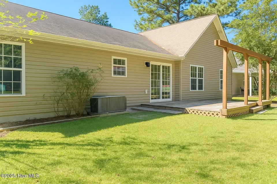 131 Marcil Lane, Hampstead, NC 28443 — 3-bedroom home in Marcil Village, Hampstead, NC, photo 1 of 17: ChatGPT Image Oct 16, 2025, 05_38_39 PM