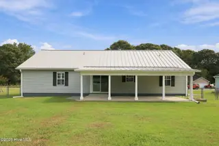 107 Fodder Drive, Hubert, NC 28539 — 3-bedroom home in Ole Mill Village, Hubert, NC, photo 5 of 59: 05_Rear_Covered_Patio