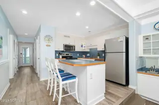 2905 Pointe West Drive B1 Pier Pointe, Emerald Isle, NC 28594 – photo 4: Kitchen w/ island seating