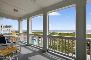 1106 Fort Fisher Boulevard N Unit 1, Kure Beach, NC 28449 – photo 1: 22 - Balcony Off Living Room