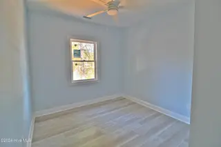 6926 Beach Drive SW, Ocean Isle Beach, NC 28469 — 3-bedroom home in Pine Acres, Ocean Isle Beach, NC, photo 10 of 12: Secondary Bedroom 2