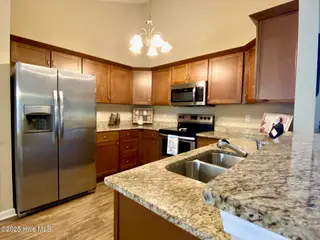 11 Court 11 Northwest Drive NW, Carolina Shores, NC 28467 — 3-bedroom home in Carolina Shores, Carolina Shores, NC, photo 9 of 28: 10-Kitchen