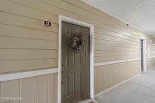 221 Woodlands Way Unit 21, Calabash, NC 28467 — 2-bedroom condo in Crow Creek, Calabash, NC, photo 6 of 39: Front Door Entry